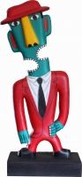 Man in red suit with green face by Catherine, Norman